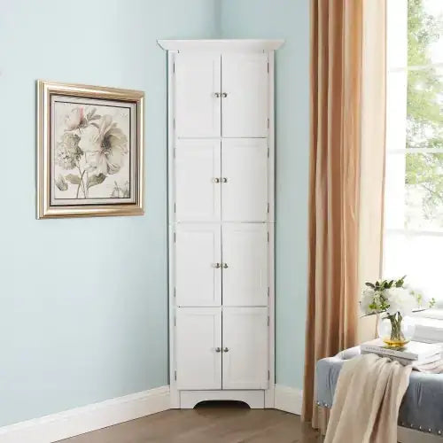 White corner cabinet with six doors and silver knobs.