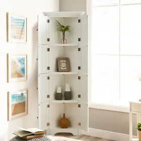 White corner shelving unit with multiple open shelves and double doors, each featuring black square hardware accents.