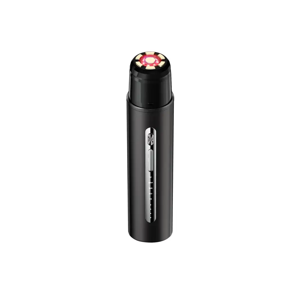 Black cylindrical facial device with a glowing red and gold circular head, featuring a silver power button on its side.