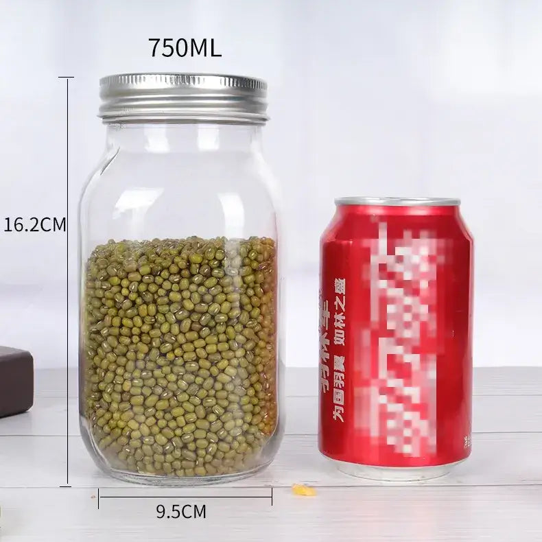 Clear glass jar with a silver metal lid, filled with green mung beans.
