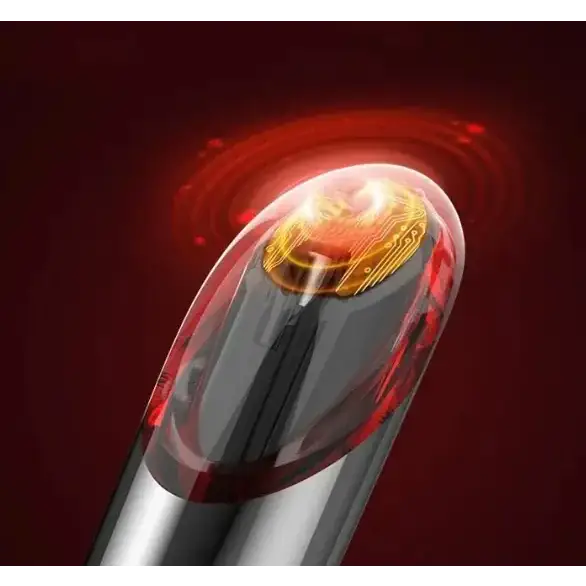 A sleek, transparent red and silver pen with a glowing golden circuit board at its tip.