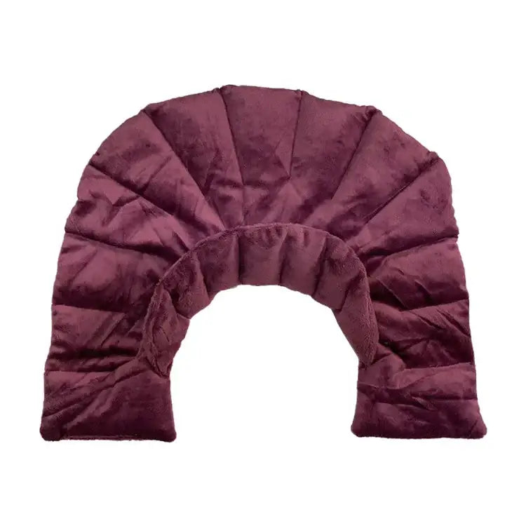 A plush, maroon-colored neck pillow with a quilted, fan-like design and soft, velvety texture.