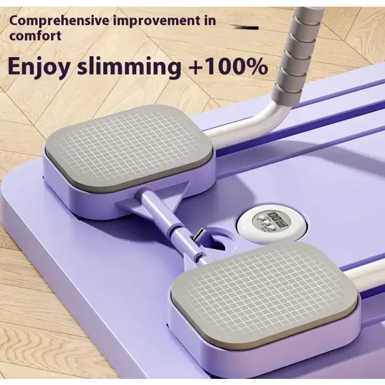 Purple and gray step aerobics machine with textured footpads and a digital display.