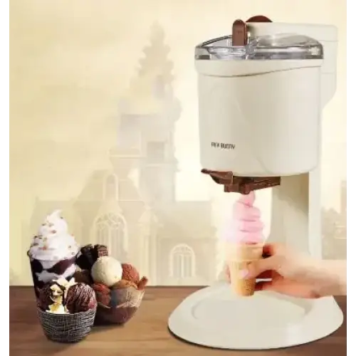 White countertop ice cream maker with a clear lid and chocolate-colored handle, dispensing pink swirls into a waffle cone.