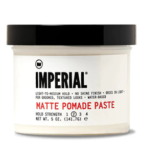 Imperial matte pomade paste in a clear jar with black lid, labeled for light-to-medium hold and no shine finish.
