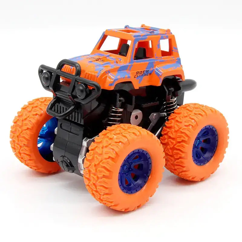 Orange and blue monster truck toy with rugged tires and black front bumper.