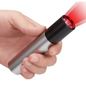 A sleek, silver cylindrical laser pointer with a black cap emitting a bright red beam.