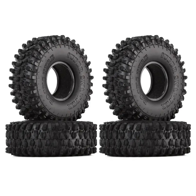 Black rubber off-road tires with aggressive tread patterns and ’super slick’ branding.