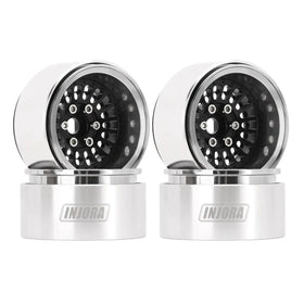 Pair of silver and black rc truck wheels with a sleek, polished metallic finish.