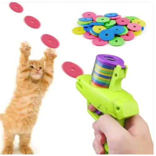 Bright green plastic toy gun with a purple and rainbow-colored disc magazine.
