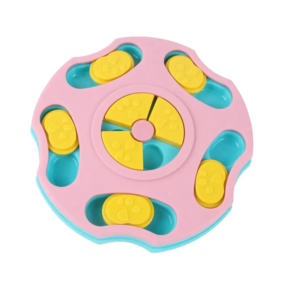 Pink and blue plastic pet feeder with yellow paw-printed levers.