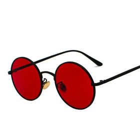 Black-framed round sunglasses with vibrant red lenses and a gold-colored nose bridge.