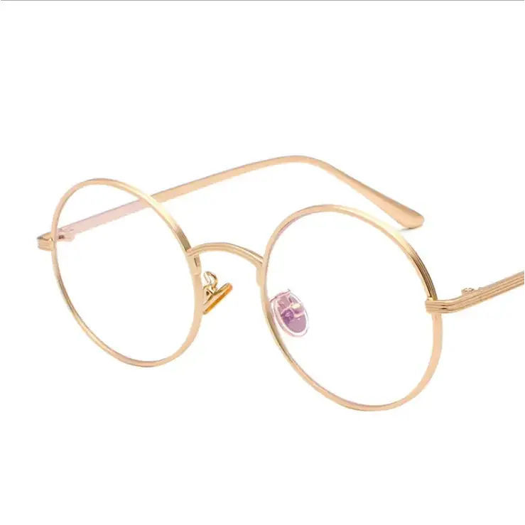 Gold-toned round-framed glasses with a minimalist design and clear lenses.