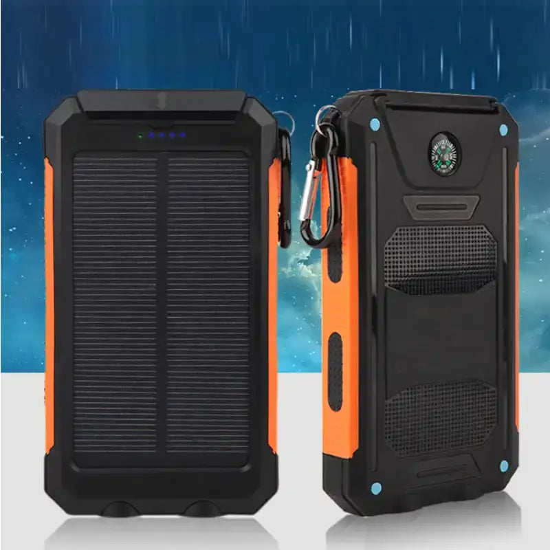 Black and orange rugged solar-powered portable charger with a built-in compass.