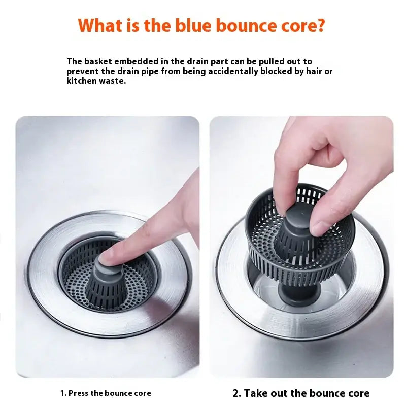 Black plastic drain basket with perforated design and central handle for easy removal.