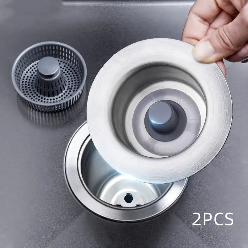 Stainless steel sink strainer with a sleek, brushed finish and integrated mesh filter.