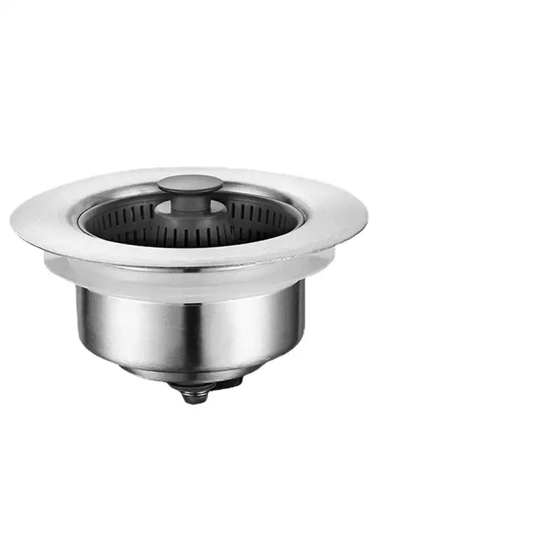 Stainless steel kitchen sink drain with a sleek, circular design and a black rubber flange.