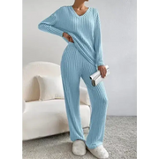 Light blue ribbed knit pajama set with a v-neck top and matching wide-leg pants.