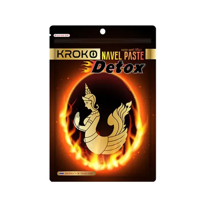 Kroko navel paste detox in a black and gold pouch featuring an illustrated golden mermaid surrounded by flames.
