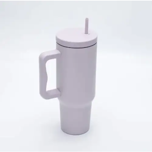 A sleek, matte gray insulated travel mug with a matching lid and handle.