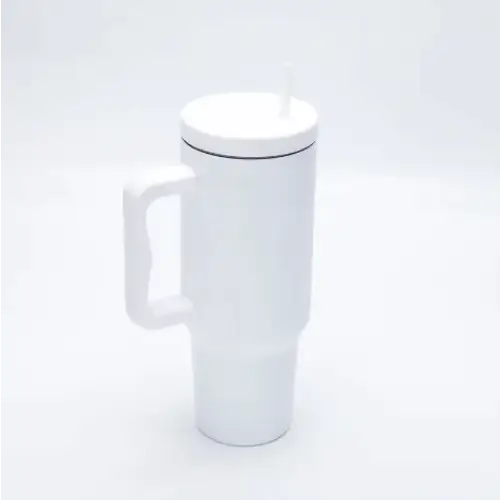 White insulated travel mug with a handle and a lid featuring an integrated straw.