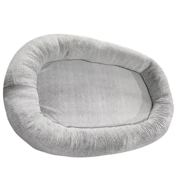 Soft gray plush pet bed with a cozy, oval-shaped design and padded edges.