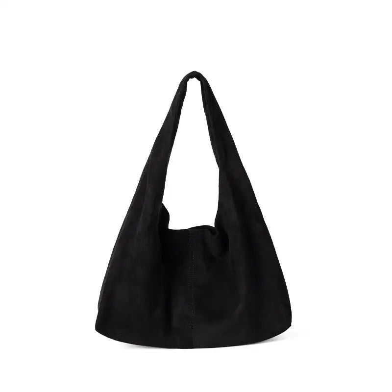 Black suede hobo bag with a soft, slouchy silhouette and wide shoulder strap.