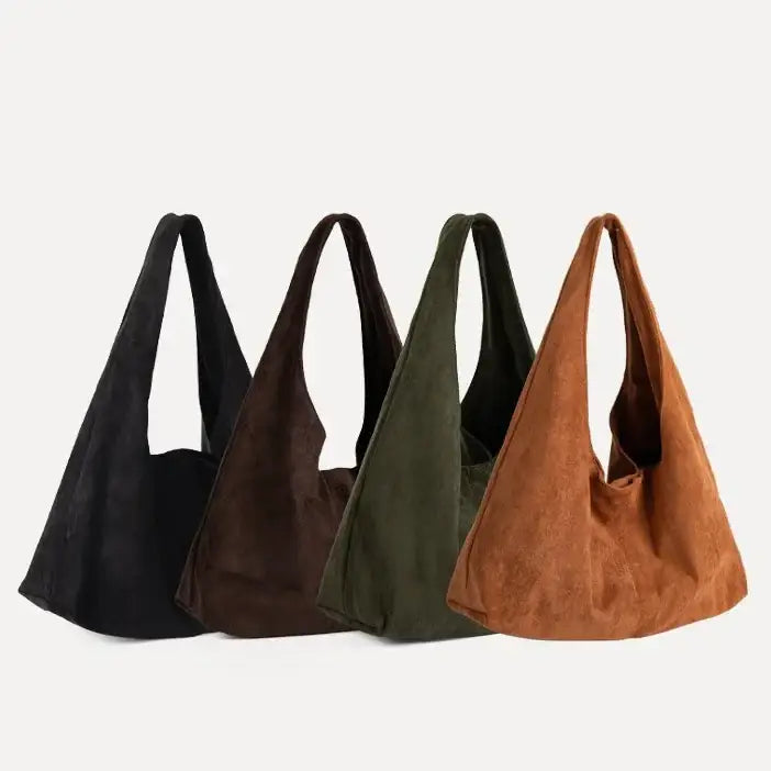 A collection of suede hobo bags in black, brown, olive green, and tan.