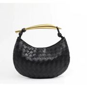 Black woven leather handbag with a gold-tone handle.