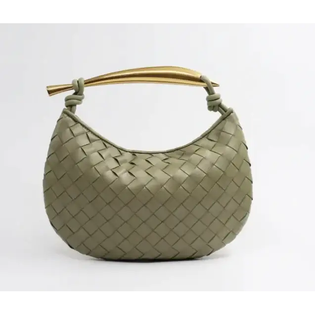Olive green woven leather handbag with a gold-tone handle.
