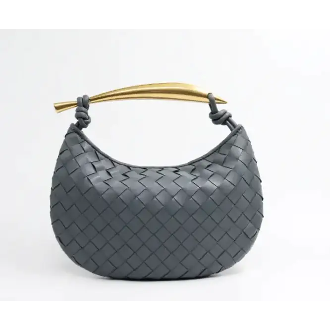 Dark gray woven leather handbag with a gold-tone handle.