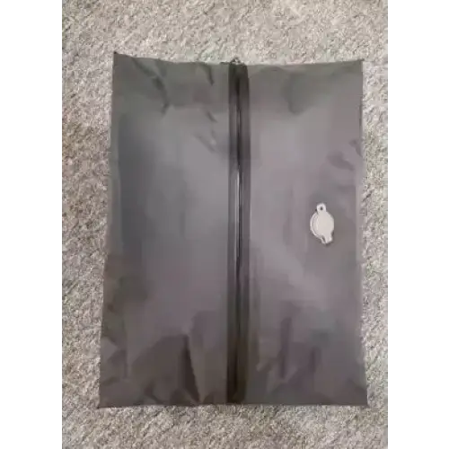 Dark gray fabric shoe bag with a black zipper and a small white embroidered logo on the upper right corner.