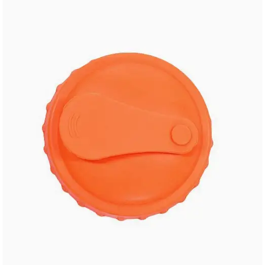 Bright orange plastic lid with a hinged flip-top mechanism and textured ridges around the edge.
