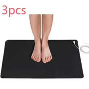 Black rectangular electric heating mat with white power cord and plug