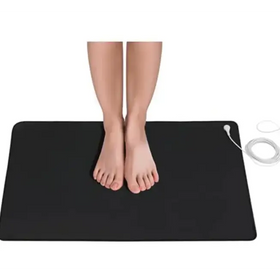 Black rectangular electric heating mat with a white power cord and plug.