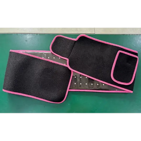 Black waist trainer with pink trim and a transparent panel revealing internal mesh.