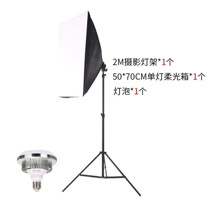 Black tripod stand with a 50x70cm softbox light diffuser attached to its top.