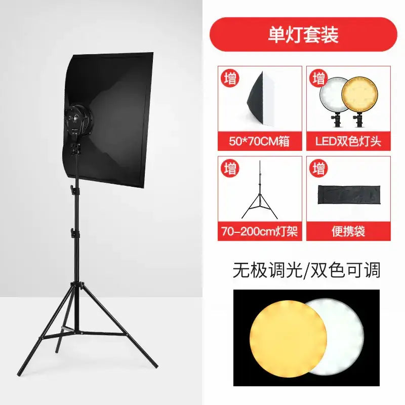 Black softbox mounted on a tripod stand for photography lighting.