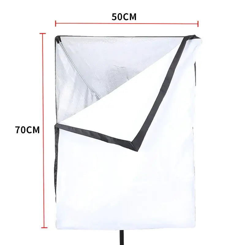 A white and black 50cm x 70cm softbox lighting panel with a reflective interior.