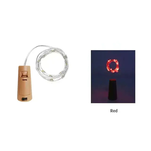 Beige battery-operated led wine cork light with a coiled silver wire and red illuminated circular design.