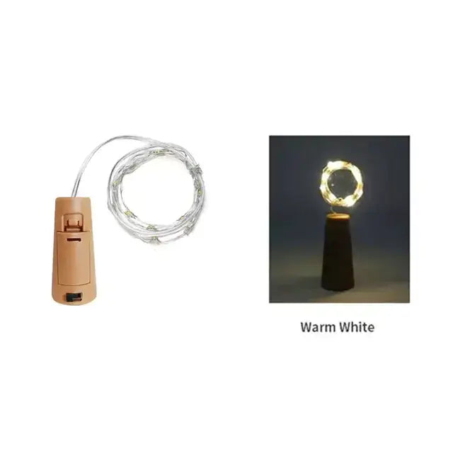 Warm white led string lights with a cork base and battery-powered cylindrical housing.