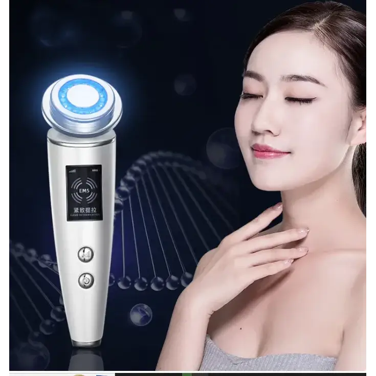 Silver handheld facial device with a glowing blue circular head and digital display panel.