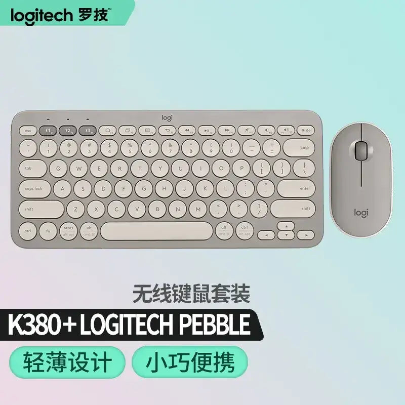 Silver logitech k380 wireless keyboard and pebble mouse set.