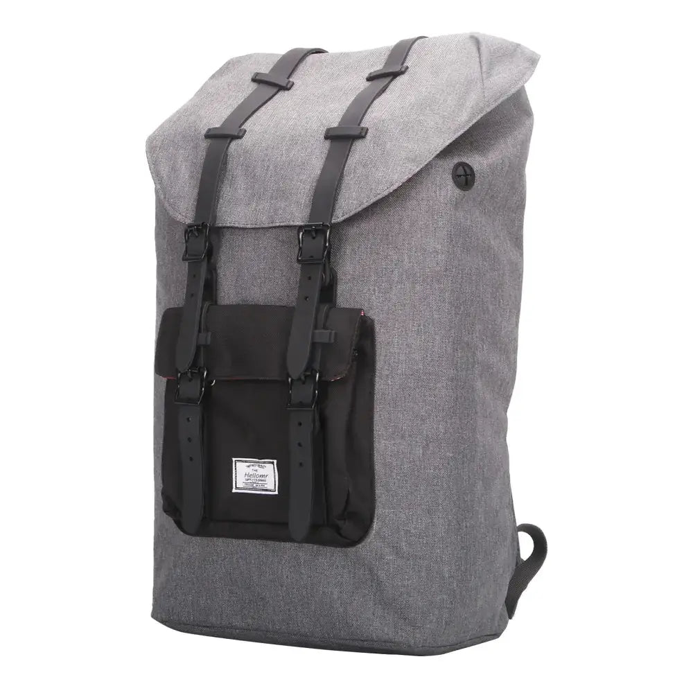 Gray heathered canvas backpack with black straps and front pocket, featuring a minimalist design.
