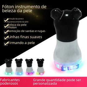 Black and translucent device with bear-like ears, featuring a glowing led base.