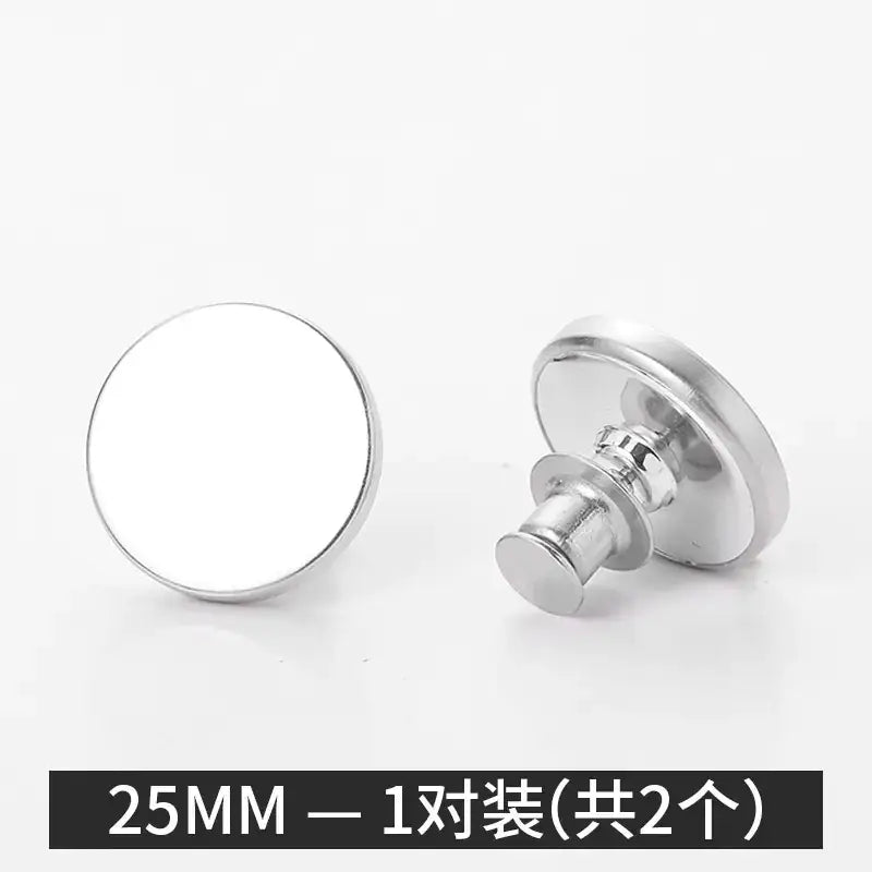Silver 25mm button fasteners, one with a flat circular face and the other showing its pin-and-clip mechanism.
