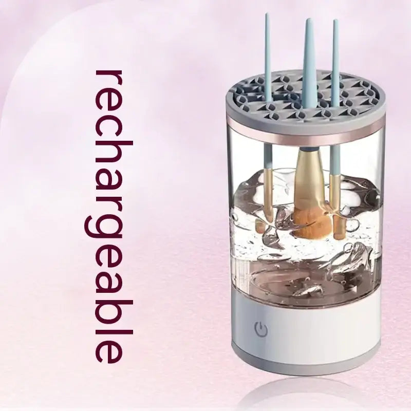 Transparent cylindrical brush cleaner with a white and gray base, holding several makeup brushes submerged in water.