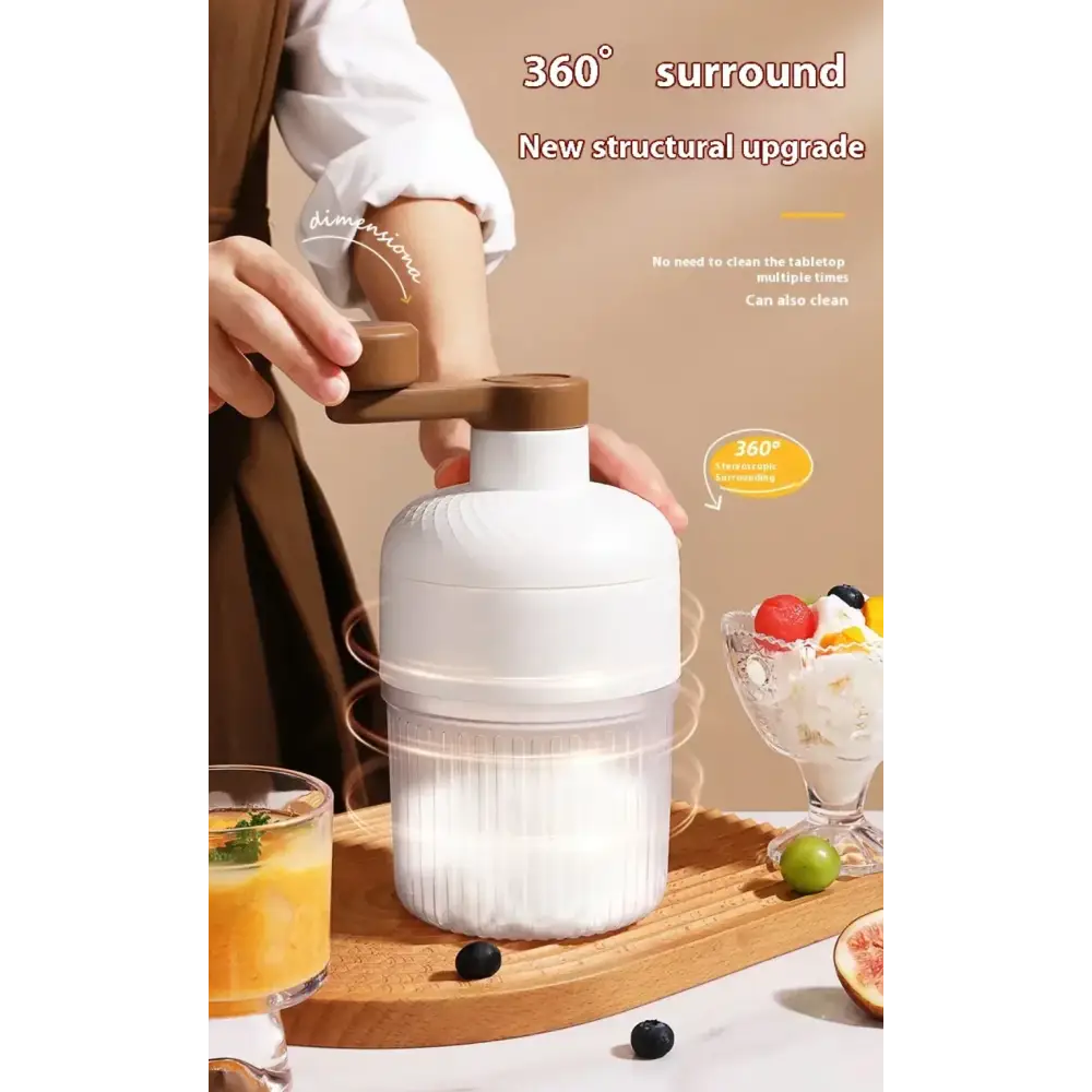 White and brown hand-cranked blender with ribbed plastic body.