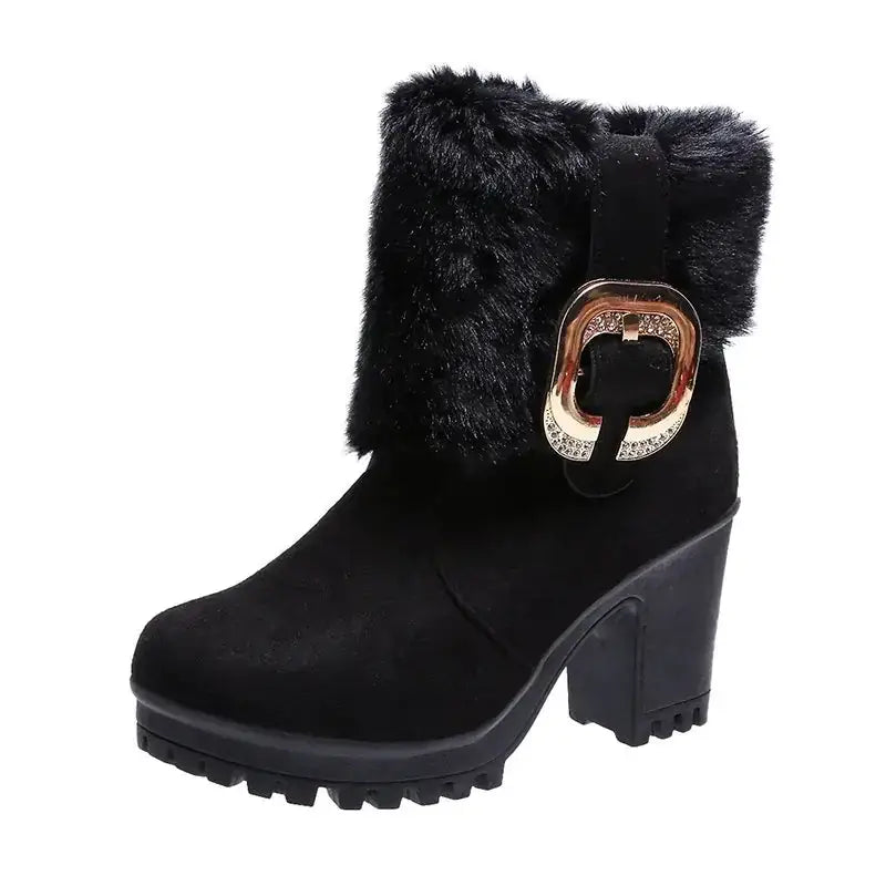 Black suede ankle boot with a plush faux fur cuff and a rose gold buckle adorned with rhinestones.