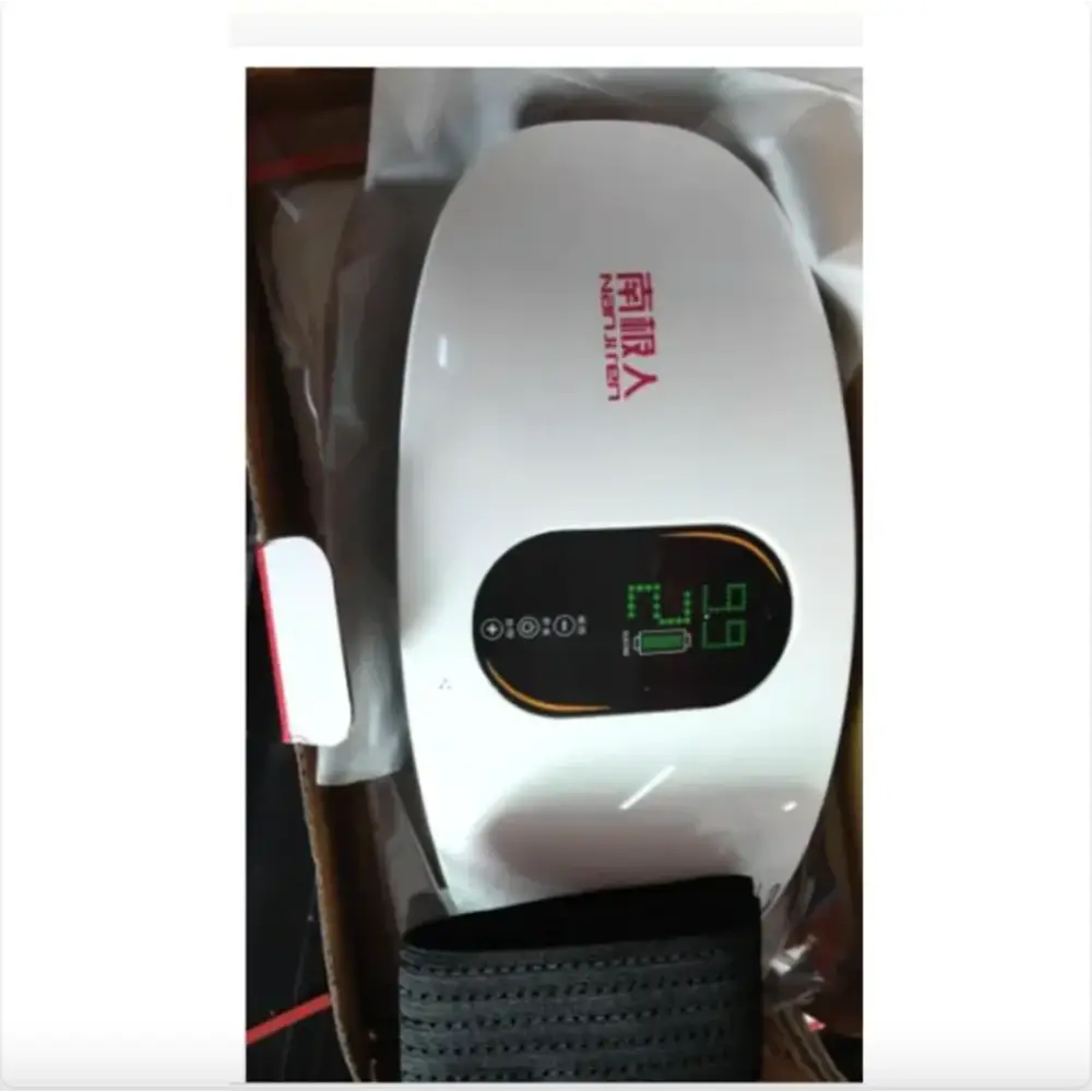 White northern brand slimming belt with a digital display showing battery level and settings.